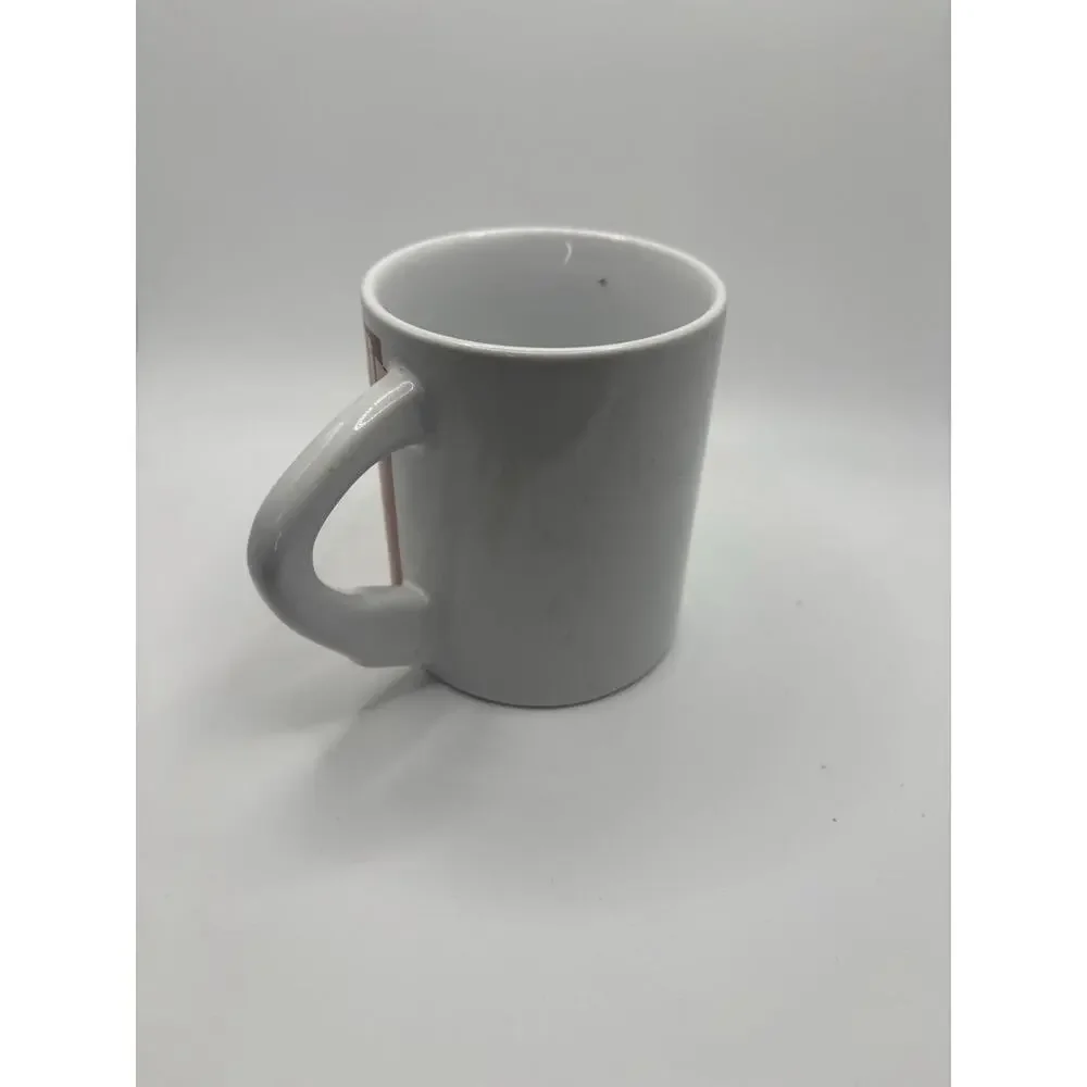 Very Unique Basketball Coffee Mug handle is the arm dunking basketball